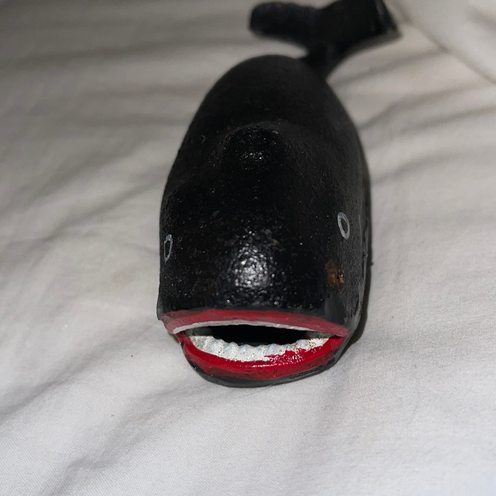 Vintage bottle opener. Could be a shark or whale.